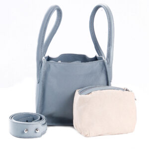 Women's sky blue leather structured sling bag with a sleek finish, adjustable strap, and spacious interior.